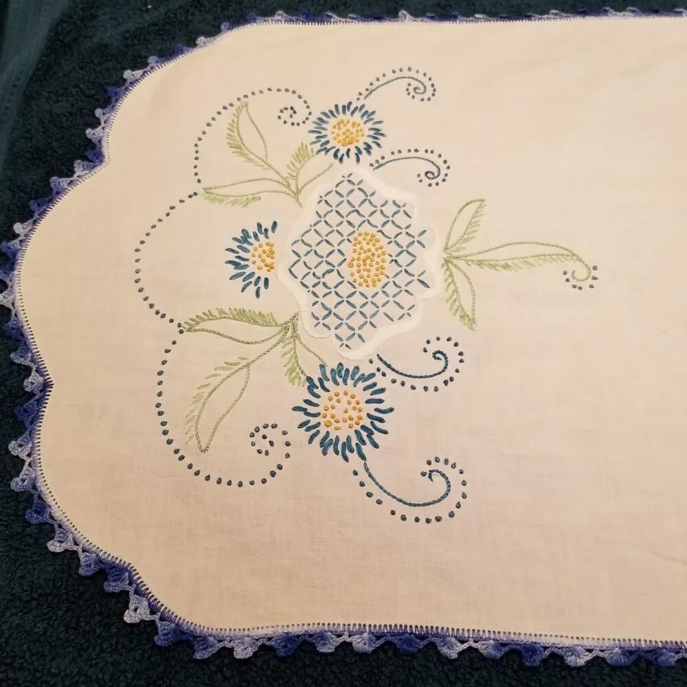 vintage handmade floral needlework table runner with a crocheted border